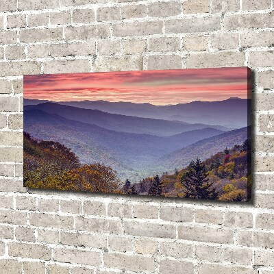 Tableau sur toile Coucher de soleil sur les montagnes