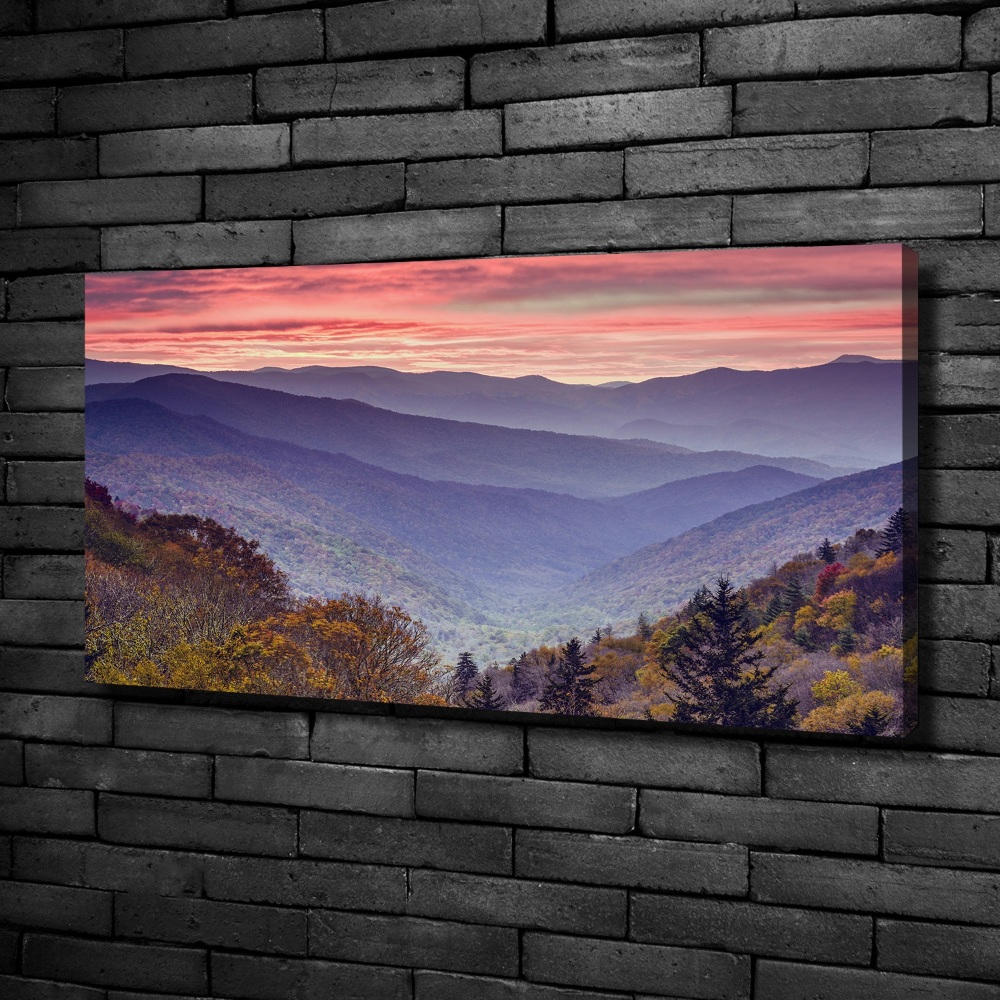 Tableau sur toile Coucher de soleil sur les montagnes