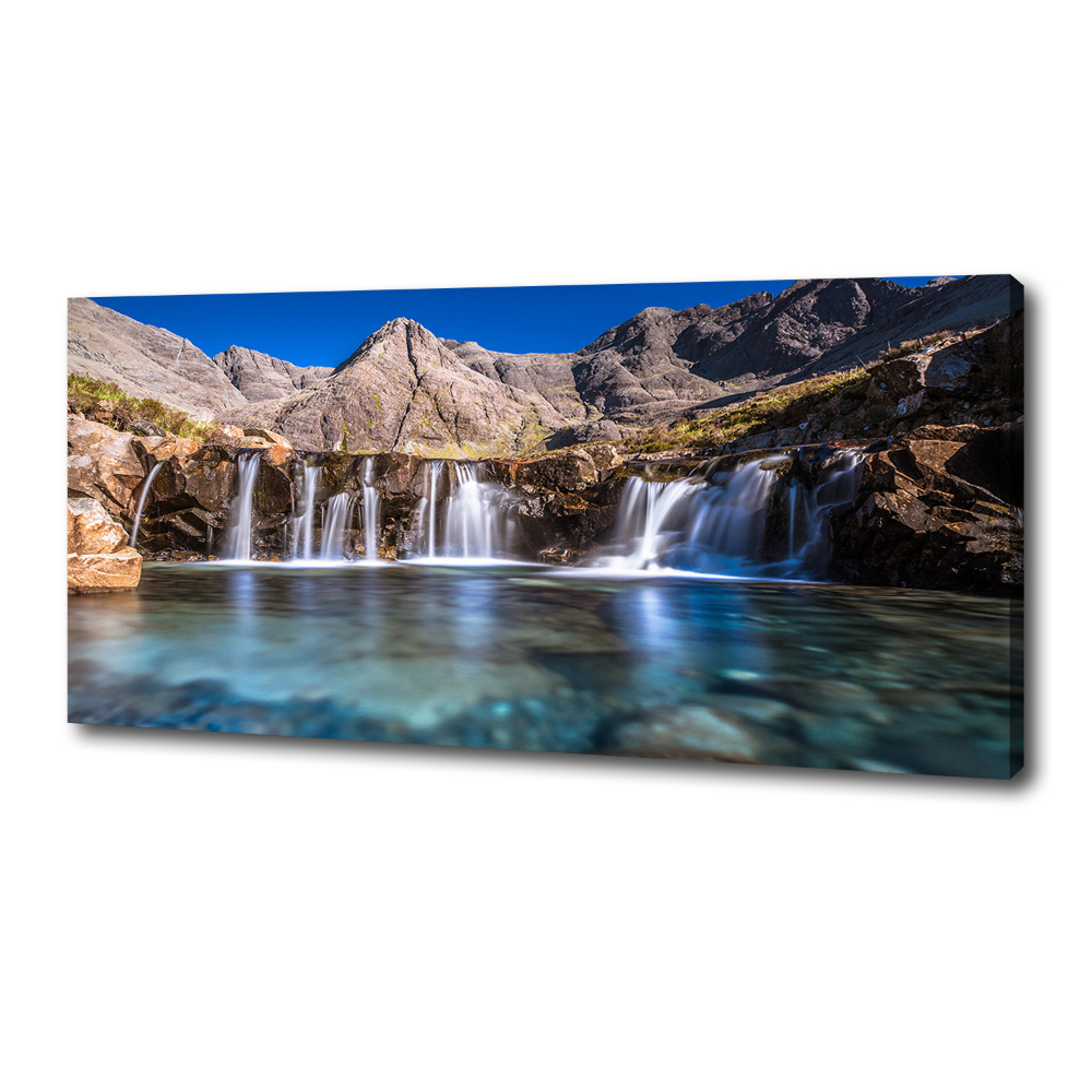 Tableau mural sur toile Chute d'eau dans les montagnes