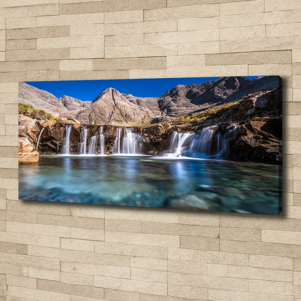 Tableau mural sur toile Chute d'eau dans les montagnes