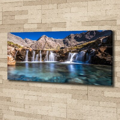 Tableau mural sur toile Chute d'eau dans les montagnes