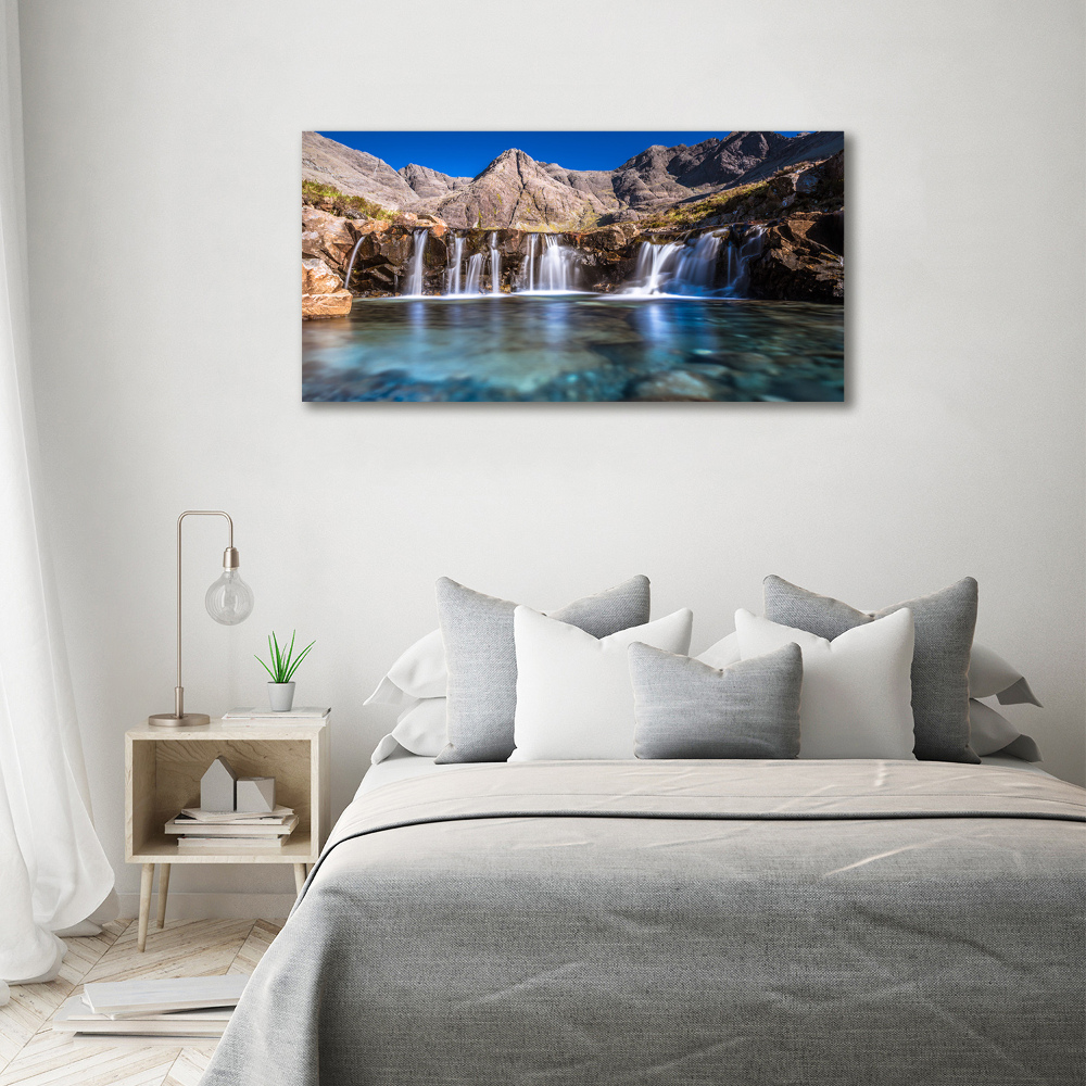 Tableau mural sur toile Chute d'eau dans les montagnes