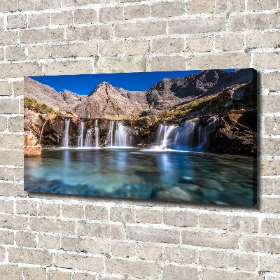 Tableau mural sur toile Chute d'eau dans les montagnes