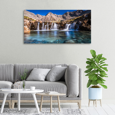 Tableau mural sur toile Chute d'eau dans les montagnes