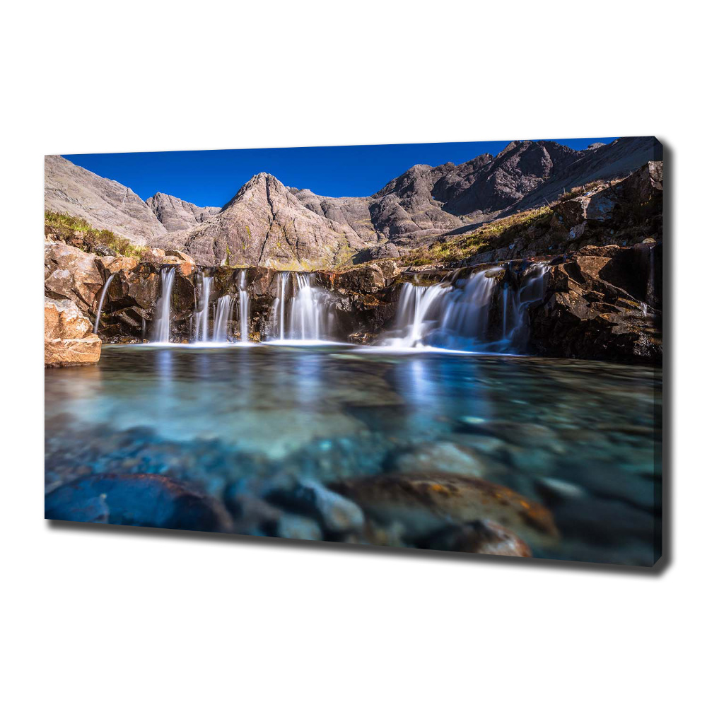 Tableau mural sur toile Chute d'eau dans les montagnes