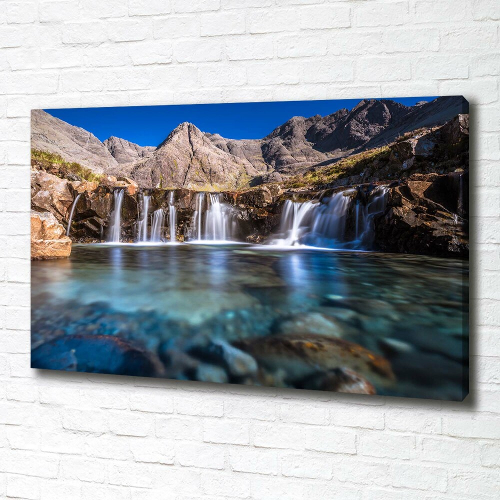 Tableau mural sur toile Chute d'eau dans les montagnes