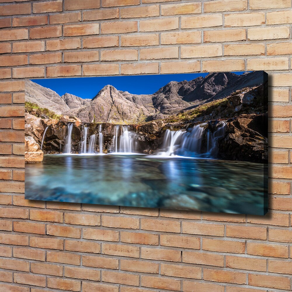 Tableau mural sur toile Chute d'eau dans les montagnes