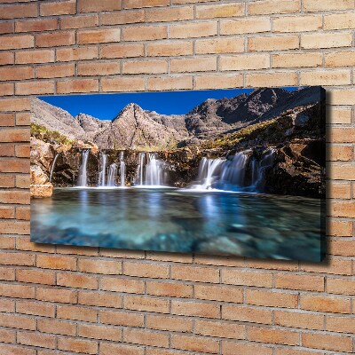 Tableau mural sur toile Chute d'eau dans les montagnes