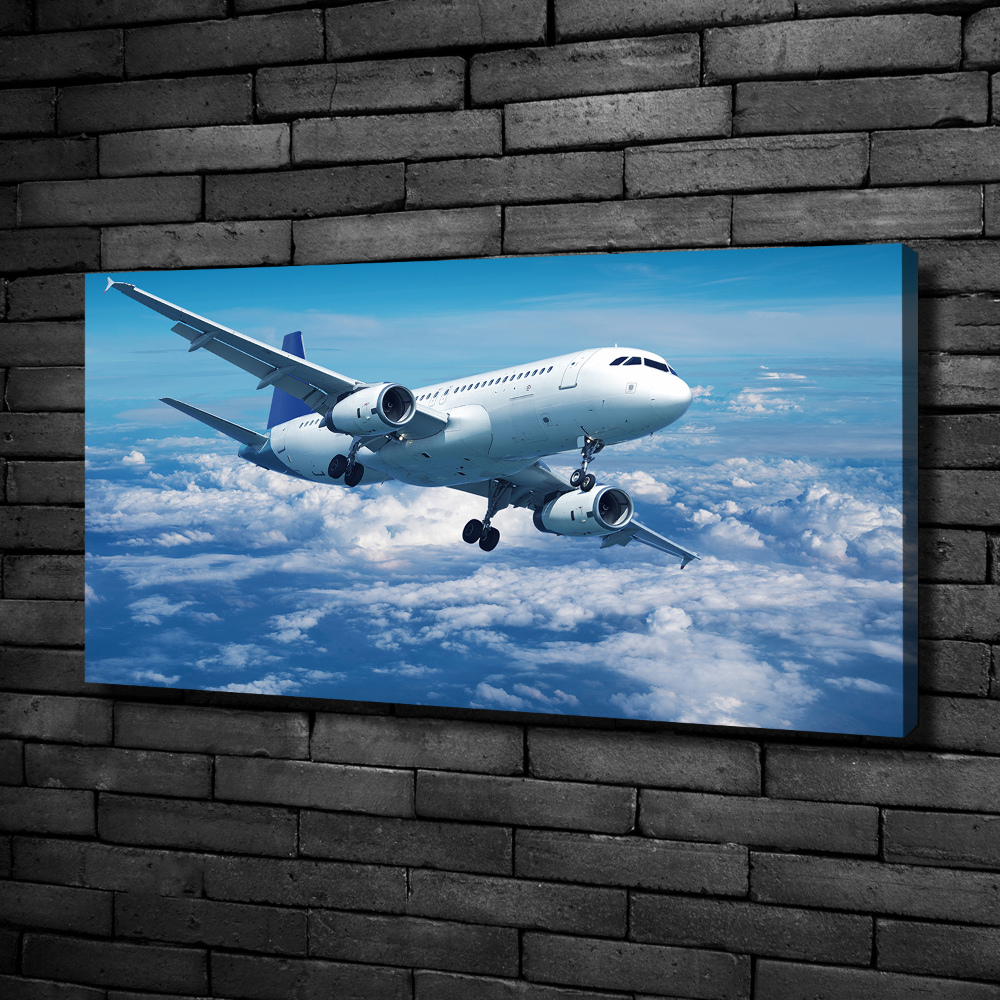 Tableau photo sur toile Avion dans les nuages