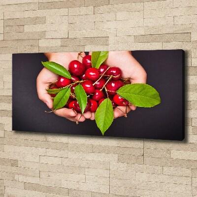 Tableau sur toile Cerises dans les mains