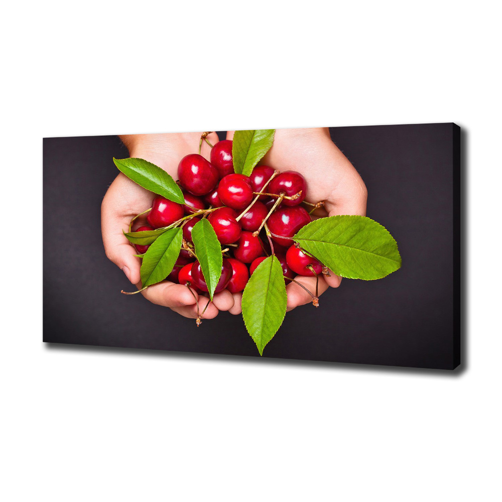 Tableau sur toile Cerises dans les mains