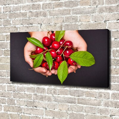 Tableau sur toile Cerises dans les mains