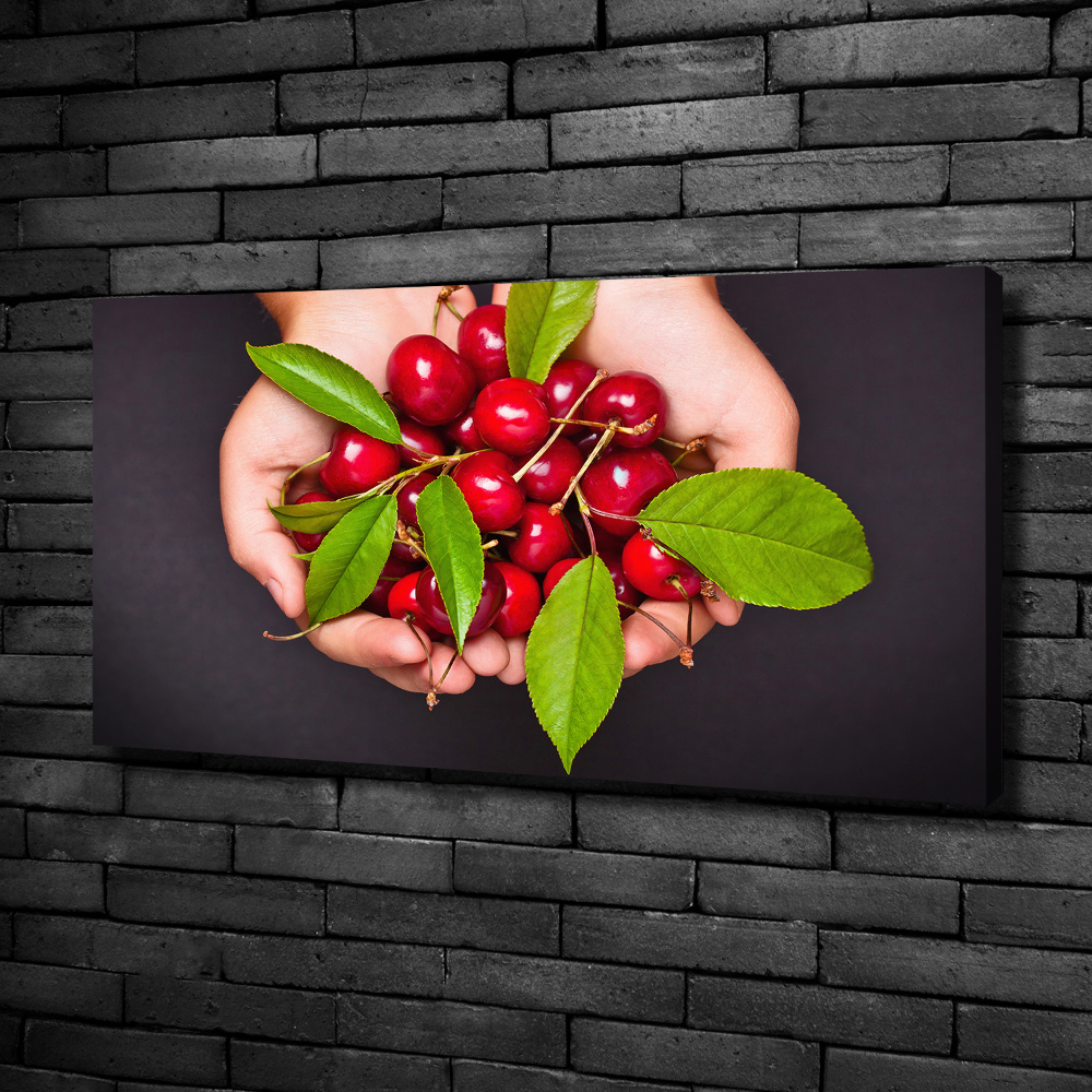 Tableau sur toile Cerises dans les mains