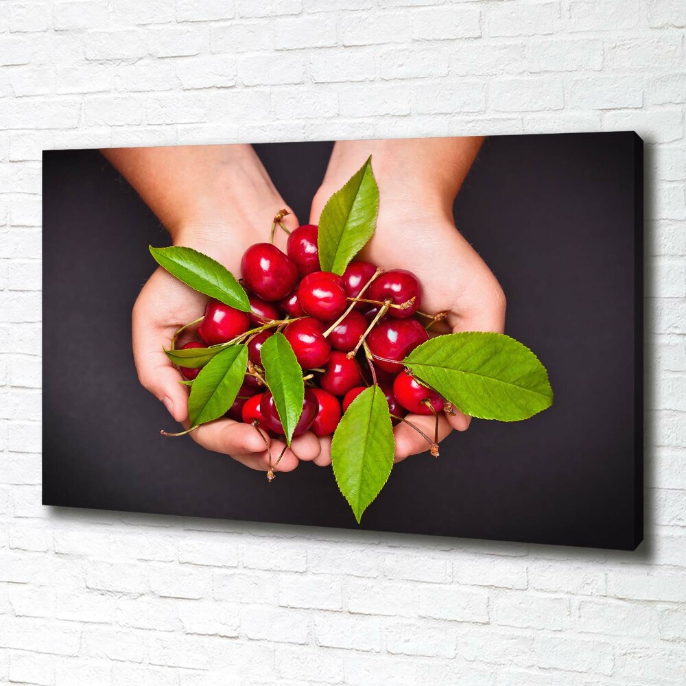 Tableau sur toile Cerises dans les mains