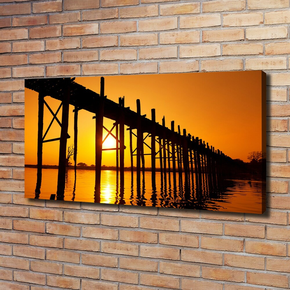 Tableau sur toile Le pont du coucher de soleil