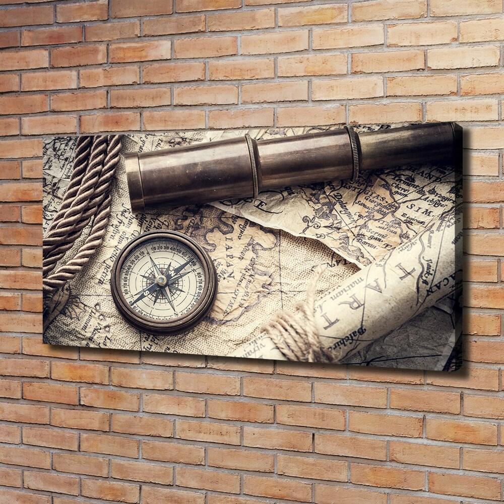 Tableau mural sur toile Boussole carte loupe