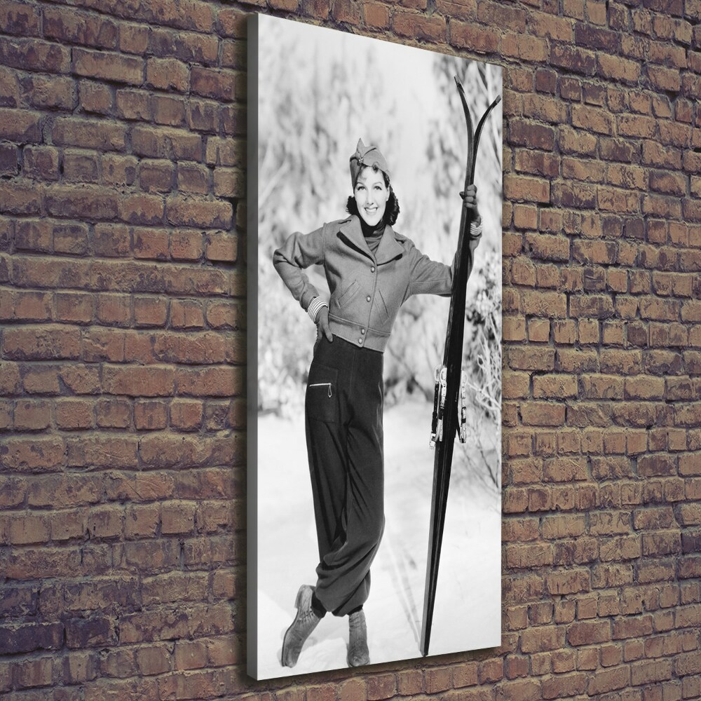 Tableau sur toile Femme avec des skis