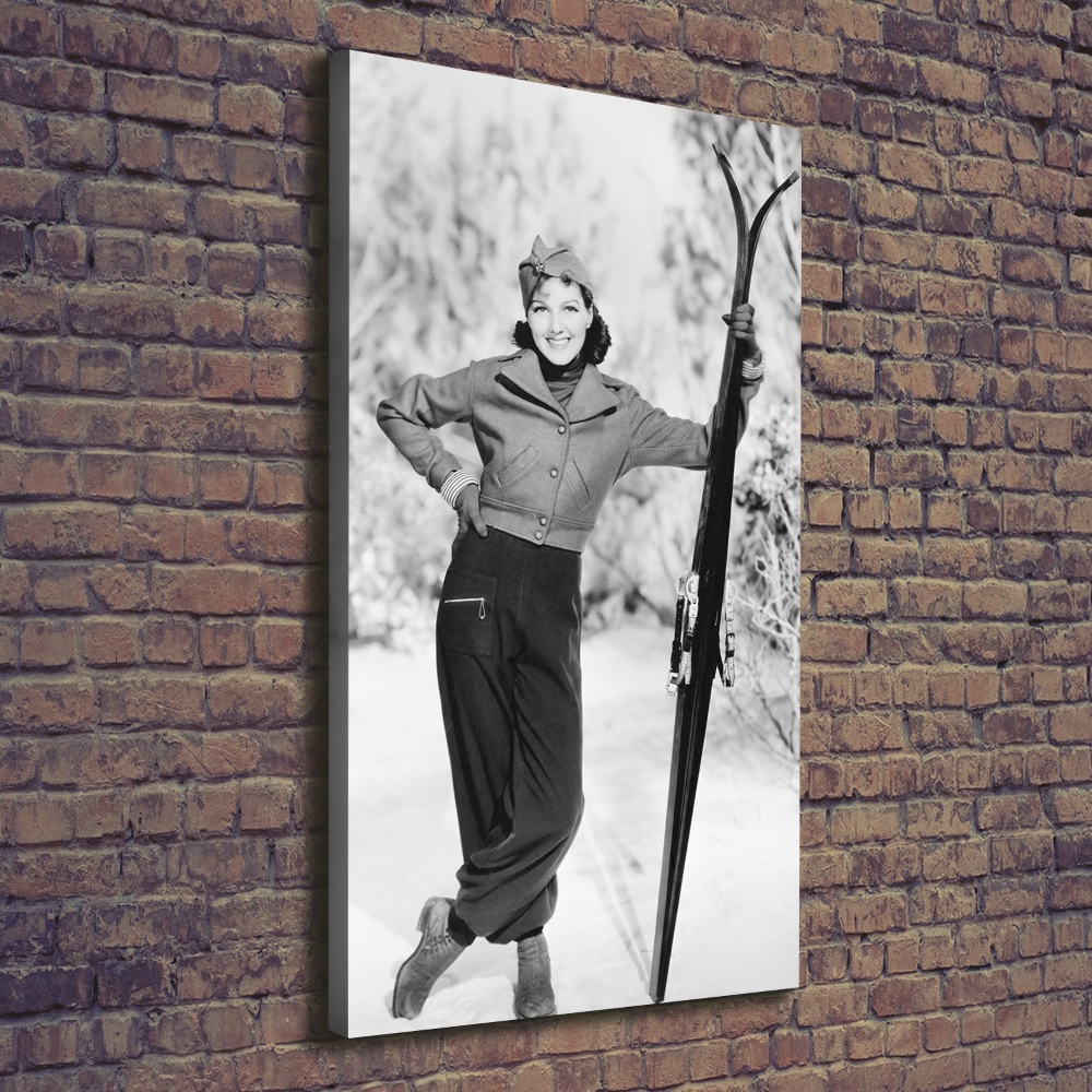 Tableau sur toile Femme avec des skis