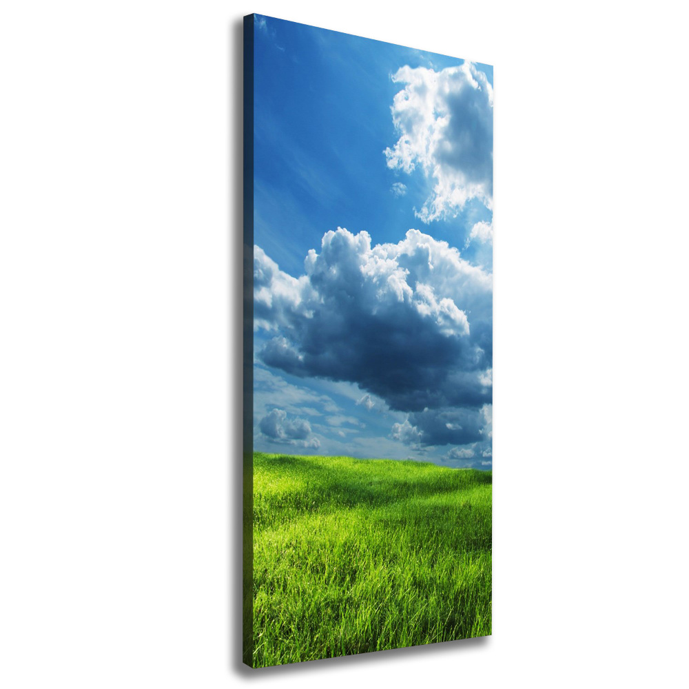 Tableau photo sur toile Nuages au-dessus d'un champ