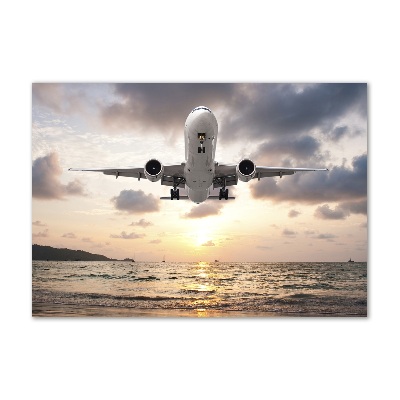 Tableau photo sur verre Avion au-dessus de la mer