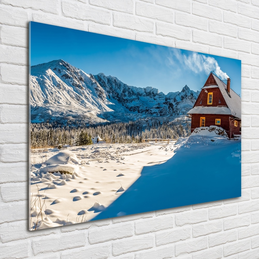 Tableau imprimé sur verre Chalet dans les montagnes