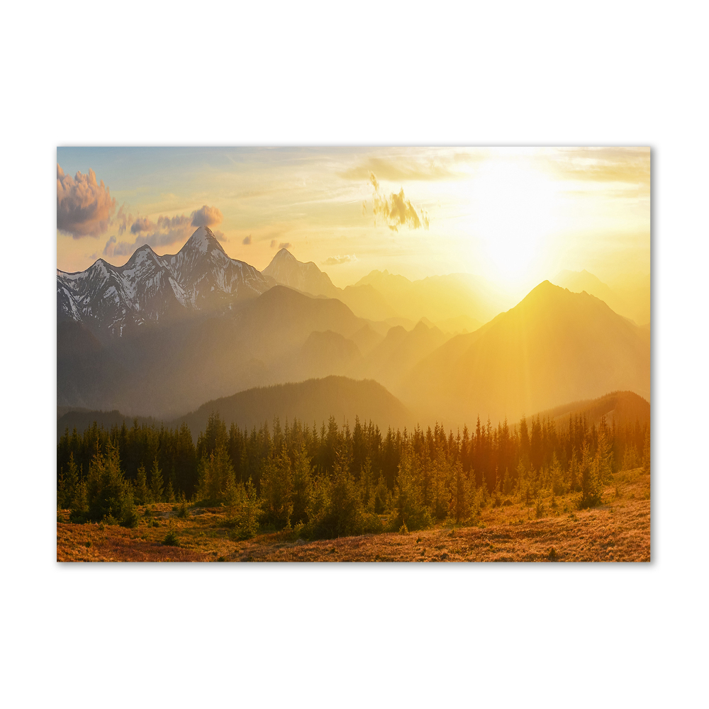 Tableau sur verre Coucher de soleil sur les montagnes