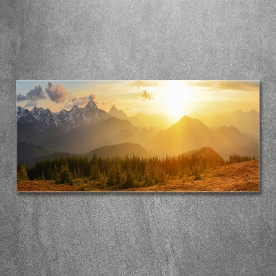 Tableau sur verre Coucher de soleil sur les montagnes