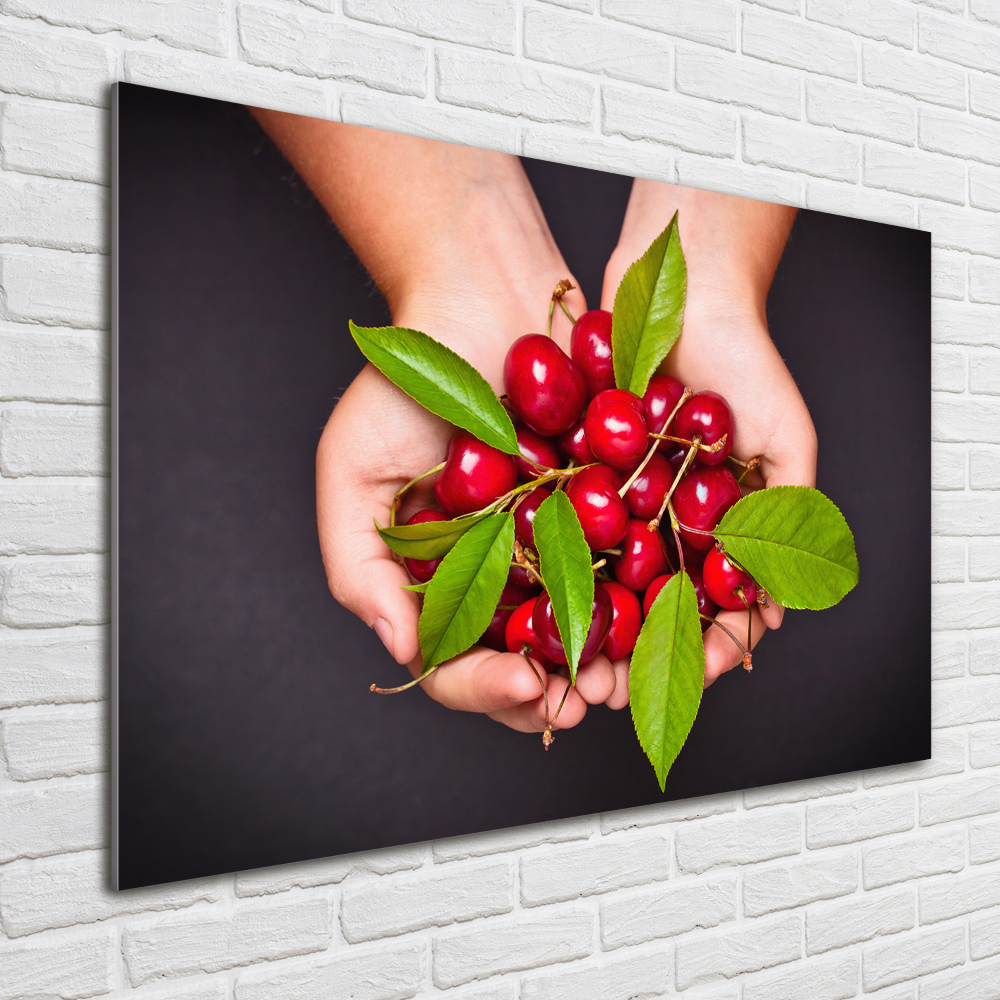 Tableau en verre Cerises dans les mains