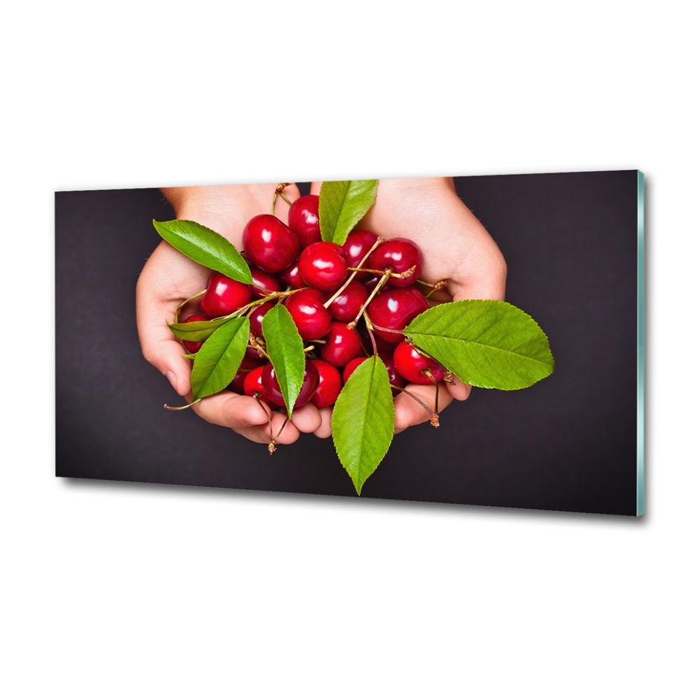 Tableau en verre Cerises dans les mains