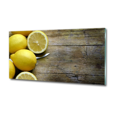 Tableau imprimé sur verre Citrons sur bois