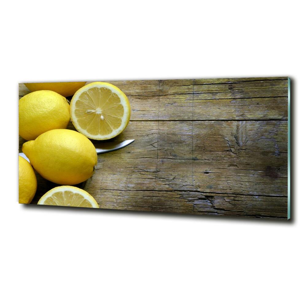 Tableau imprimé sur verre Citrons sur bois