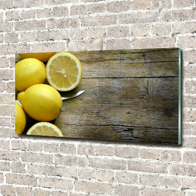 Tableau imprimé sur verre Citrons sur bois