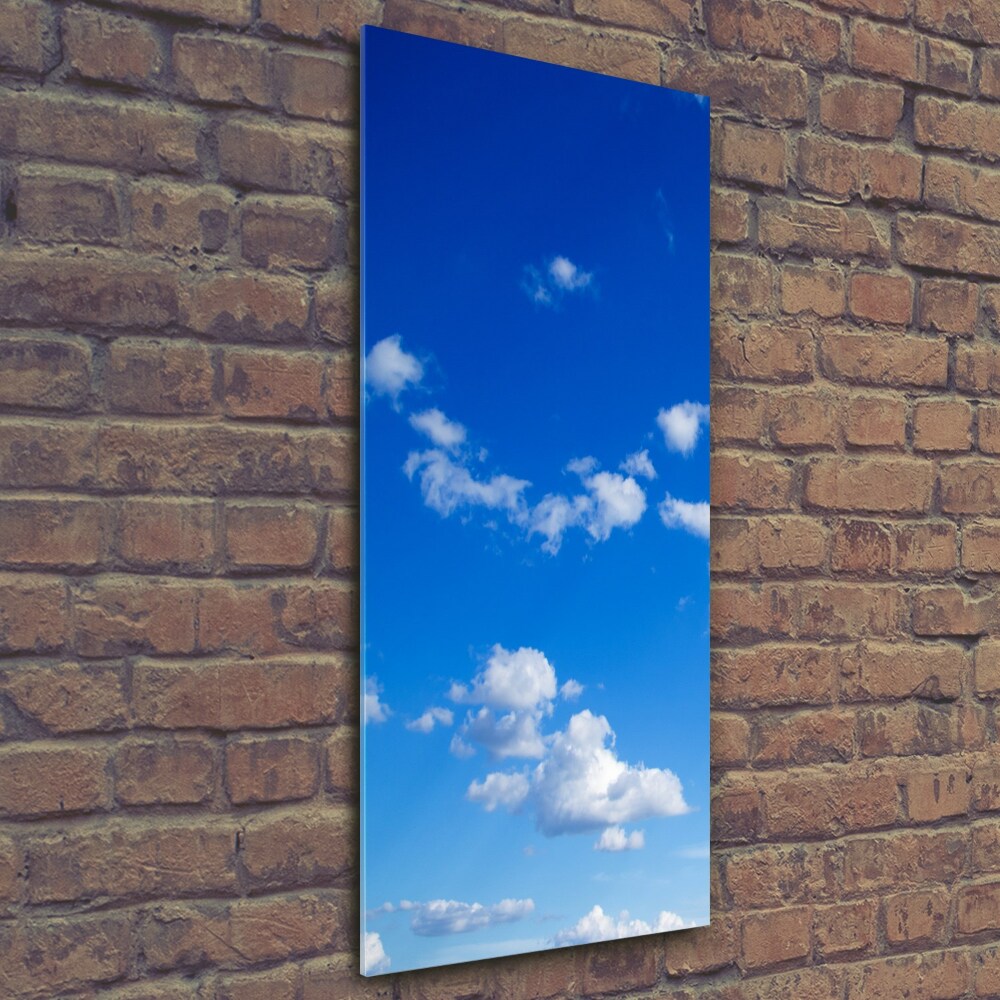 Tableau imprimé sur verre Nuages dans le ciel bleu