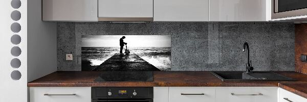 Panneaux muraux cuisine Guitariste sur une jetée
