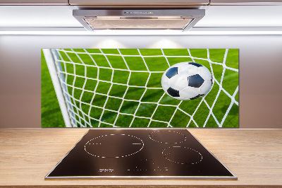 Crédence en verre cuisine Le ballon dans les grilles