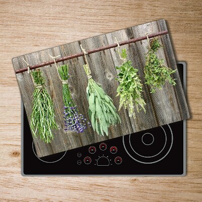 Protection plaque induction Herbes sur une ficelle de bois