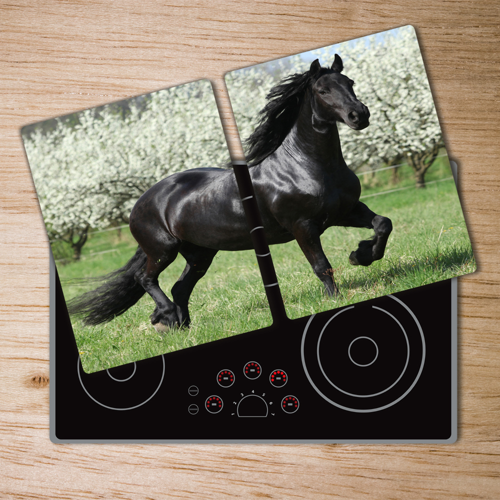 Protection plaque induction Cheval noir fleurissant les arbres