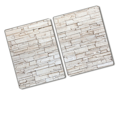 Protection plaque induction Mur de pierres blanches