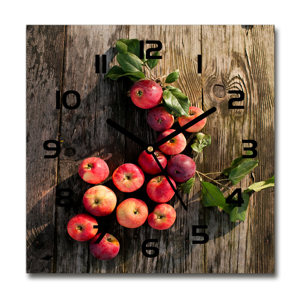 Horloge murale carrée Pommes sur la table