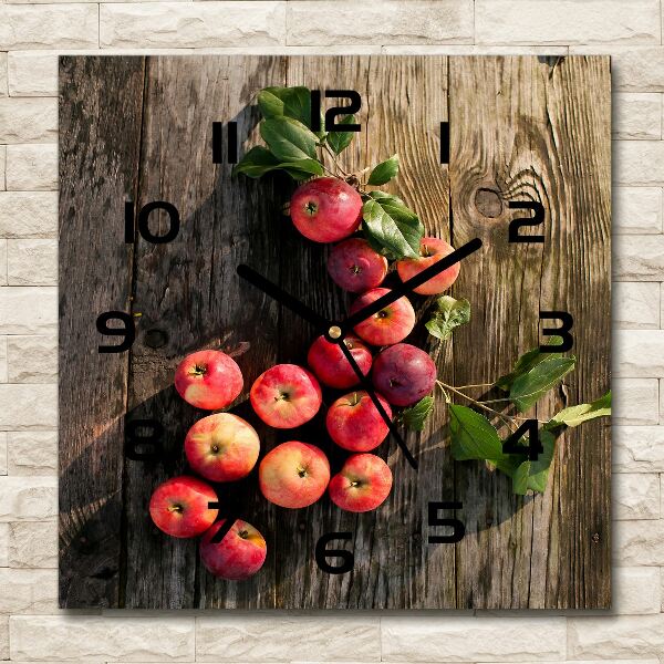 Horloge murale carrée Pommes sur la table