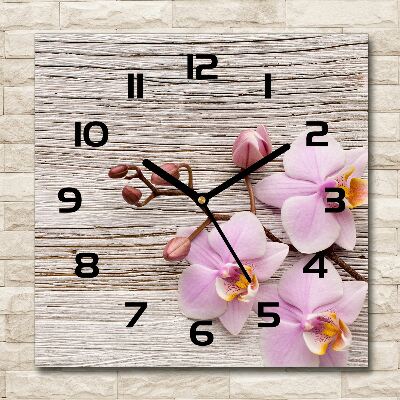 Horloge carrée en verre Orchidée sur bois