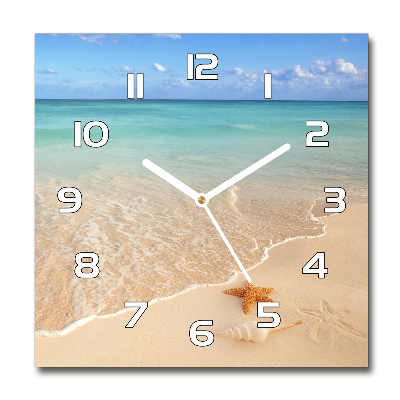 Horloge carrée en verre Étoile de mer sur la plage