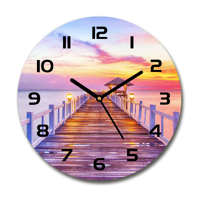 Horloge en verre ronde Jetée en bois coucher de soleil