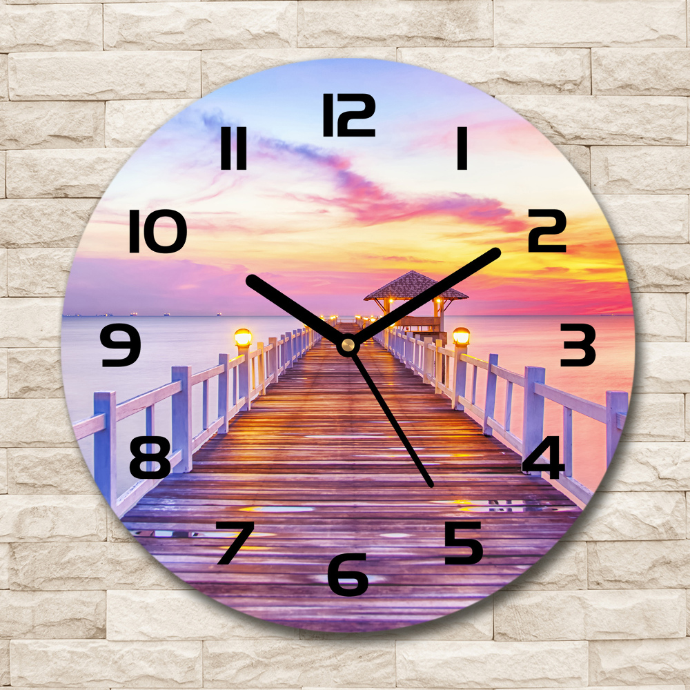 Horloge en verre ronde Jetée en bois coucher de soleil