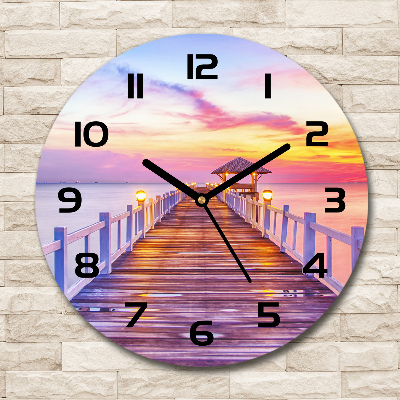 Horloge en verre ronde Jetée en bois coucher de soleil