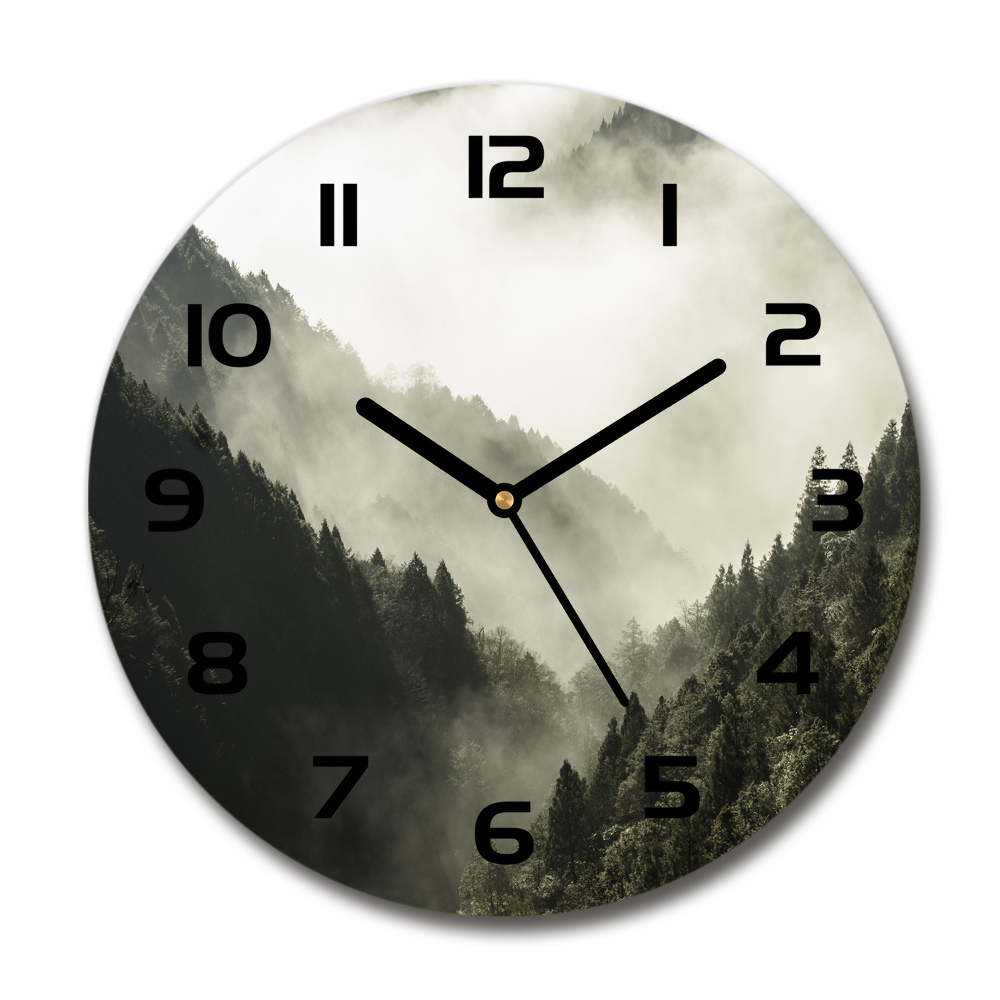 Horloge en verre ronde Brume sur la forêt