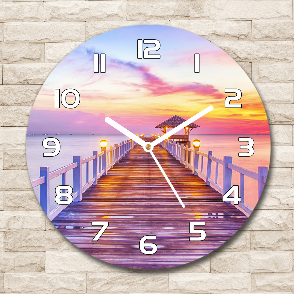 Horloge en verre ronde Jetée en bois coucher de soleil