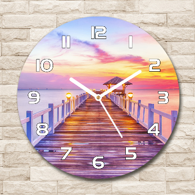 Horloge en verre ronde Jetée en bois coucher de soleil