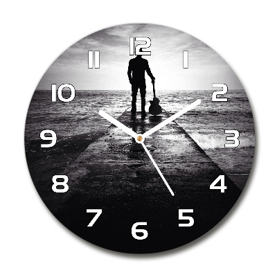 Horloge ronde murale Guitariste sur une jetée