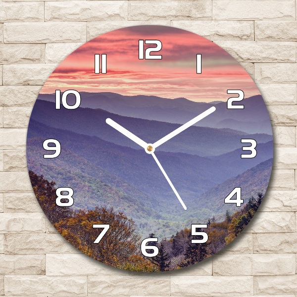 Horloge ronde murale Coucher de soleil en montagne